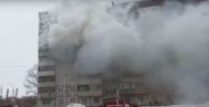 26 человек вывели спасатели Новосибирска из горящего дома